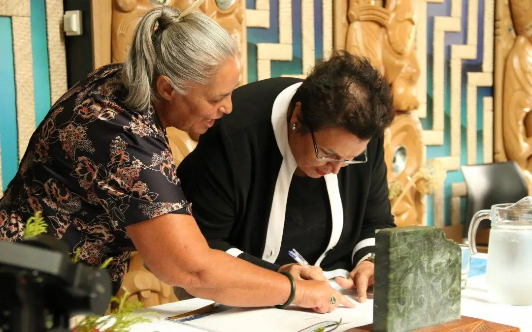 Signing.